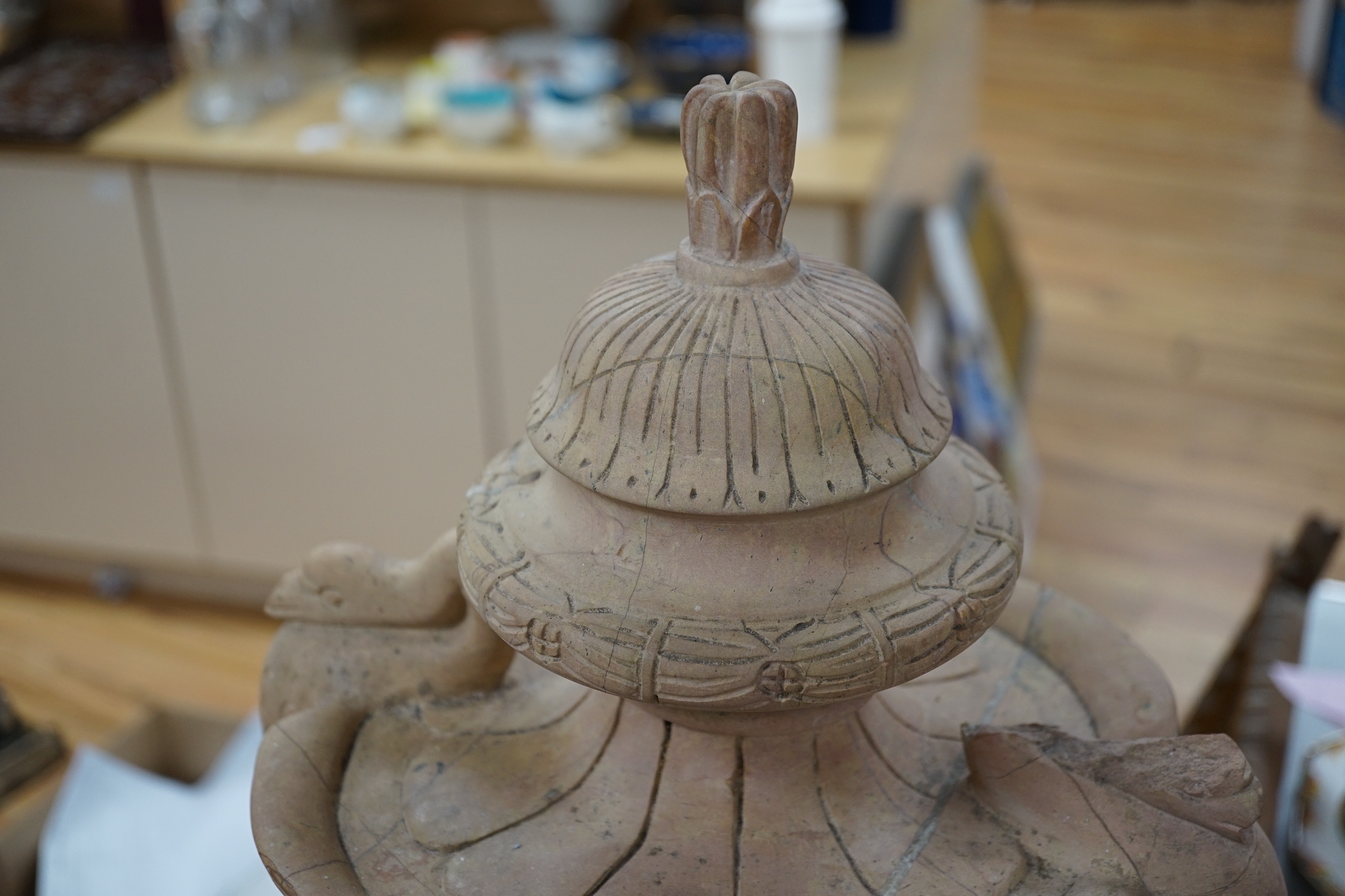 A large pair of Italian carved hardstone finial urns, 59cm
